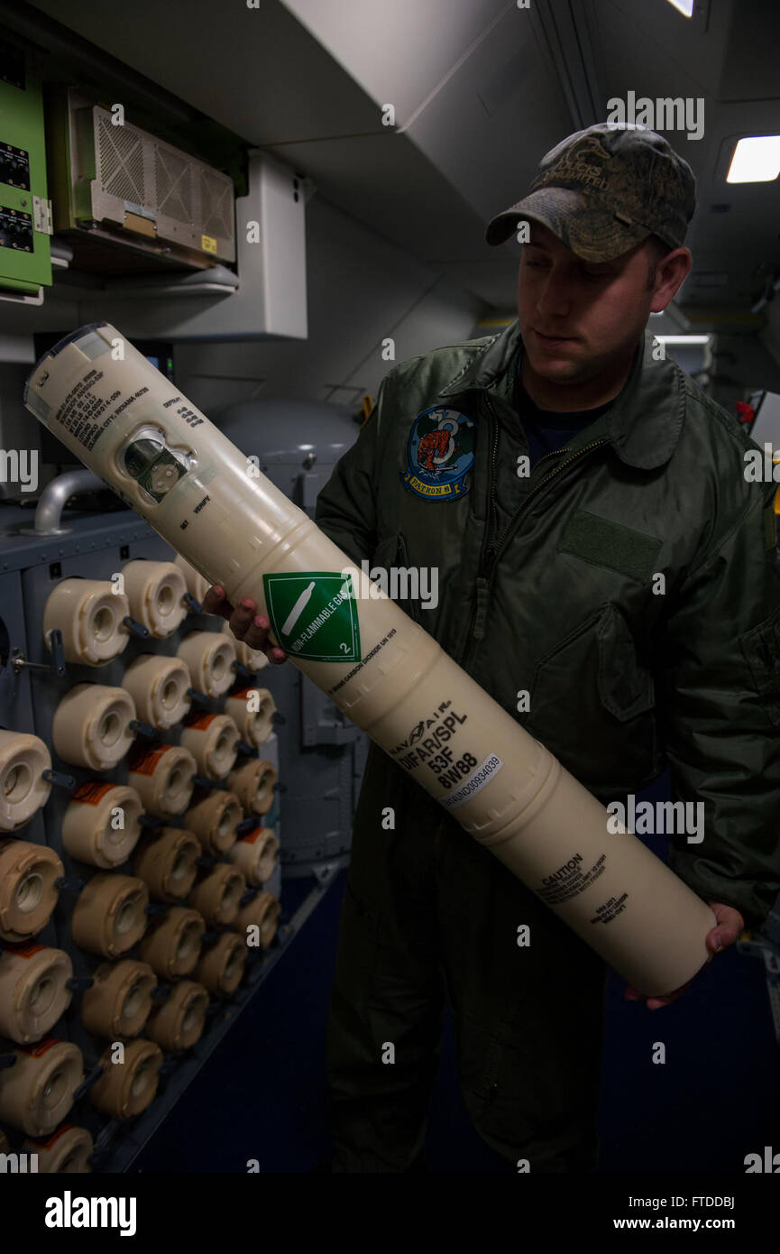 150609-F-OG770-050  (June 9, 2015) A sailor from the U.S. Navy Patrol Squadron Eight from Naval Air Station Jacksonville, Fla., holds up a sonobuoy in a Boeing P-8 Poseidon maritime surveillance aircraft during a BALTOPS 2015 mission on the flightline of Spangdahlem Air Base, Germany, June 9, 2015. Sailors aboard the aircraft use sonobuoys to conduct anti-submarine warfare and underwater acoustic research. Seventeen NATO and partner nations are participating in the 43rd iteration of the multinational maritime exercise BALTOPS 2015 in Poland, Sweden, Germany, and throughout the Baltic Sea. (U.S Stock Photo