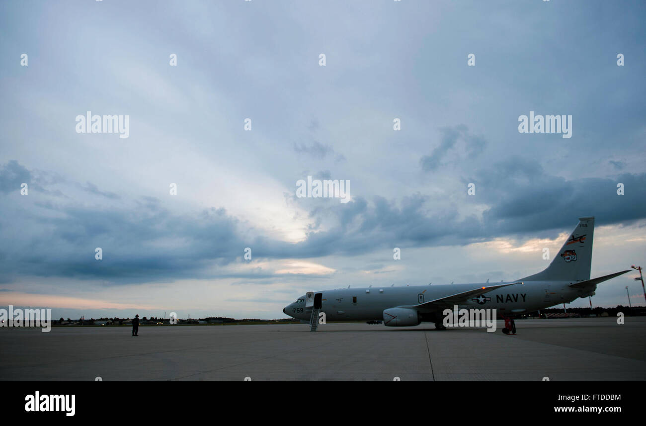 150609-F-OG770-096 (June 9, 2015)  A Boeing P-8 Poseidon maritime surveillance aircraft remains parked on the tarmac during a BALTOPS 2015 mission on the flightline of Spangdahlem Air Base, Germany, June 9, 2015. Exercises like BALTOPS enable participants to advance information sharing, which is crucial to maintaining regional stability and maritime security in the region, as well as to enhance the capability to conduct multinational peacekeeping missions. (U.S. Air Force photo by Airman 1st Class Timothy Kim/Released) Stock Photo