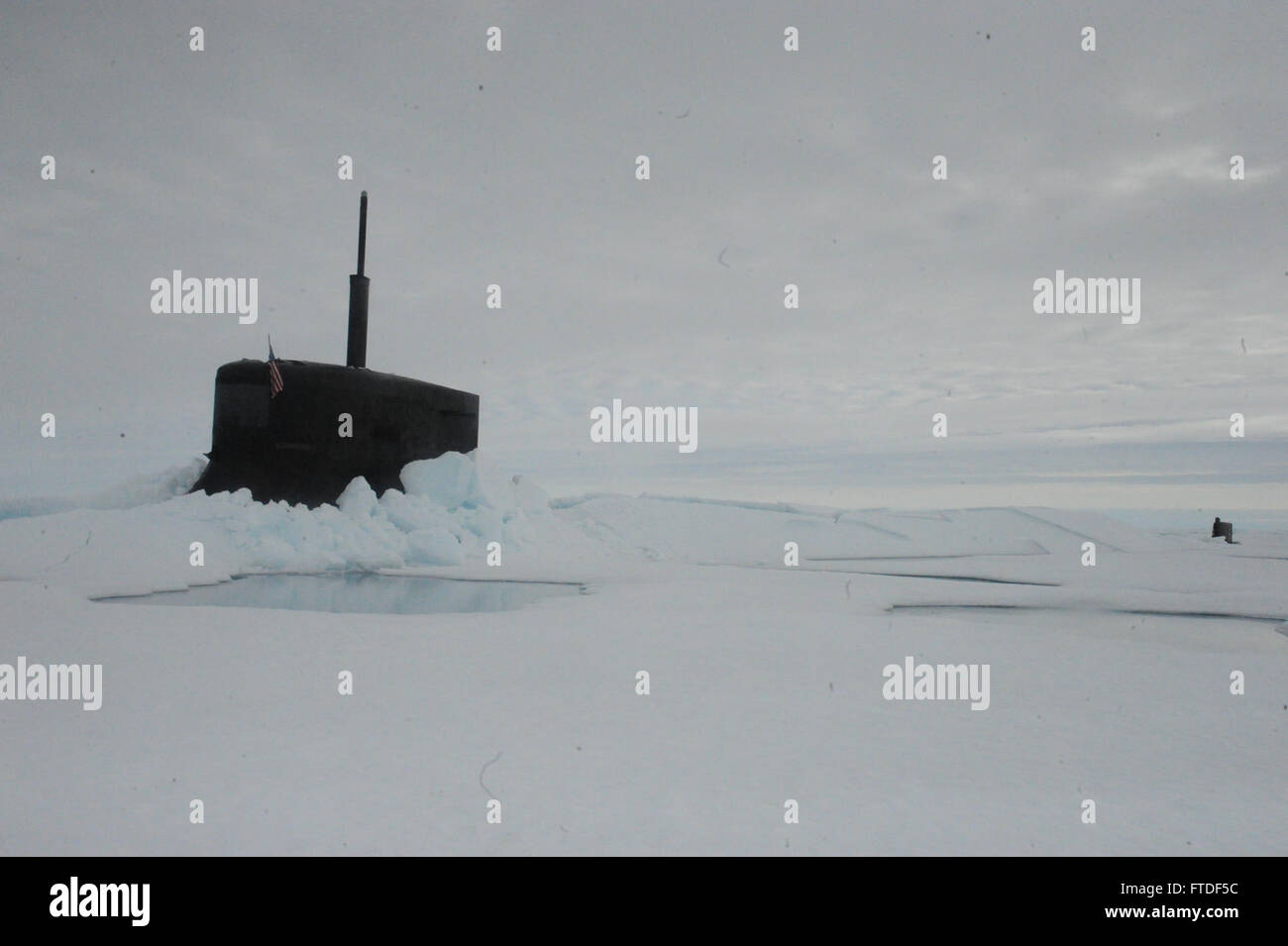 150730-N-ZZ999-004 NORTH POLE (July 30, 2015) The fast attack submarine USS Seawolf (SSN 21) is submerged after surfacing through the arctic ice July 30, 2015. Seawolf, homeported in Bangor, Washington, is conducting naval operations in the U.S. 6th Fleet area of operations in support of U.S. national security interests in Europe. (U.S. Navy photo/Released Stock Photo