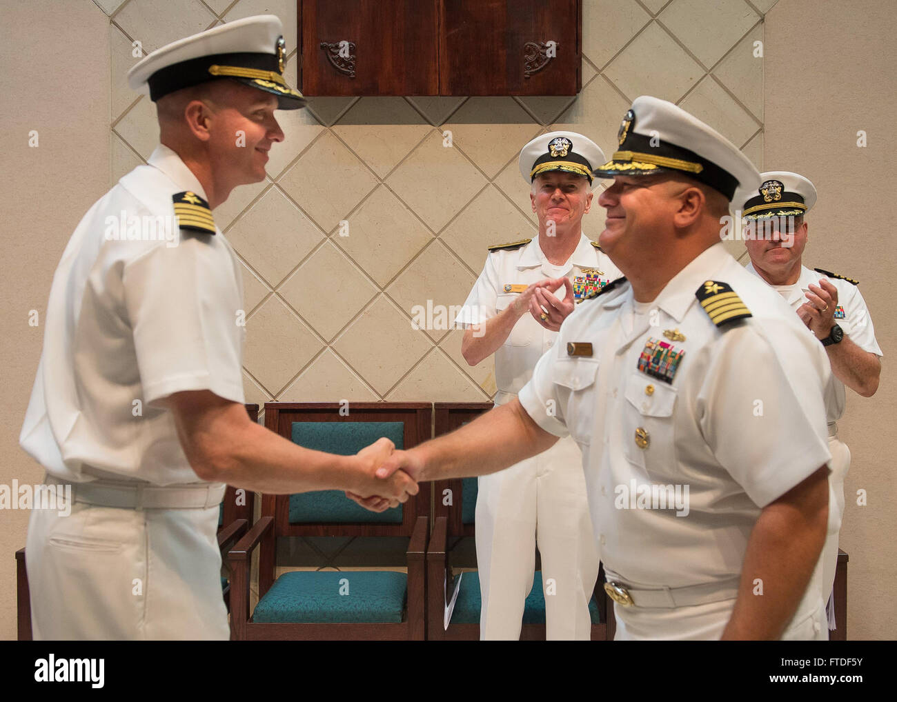 150803-N-FQ994-177 NAPLES, Italy (Aug. 3, 2015) Capt. James Aiken, left ...