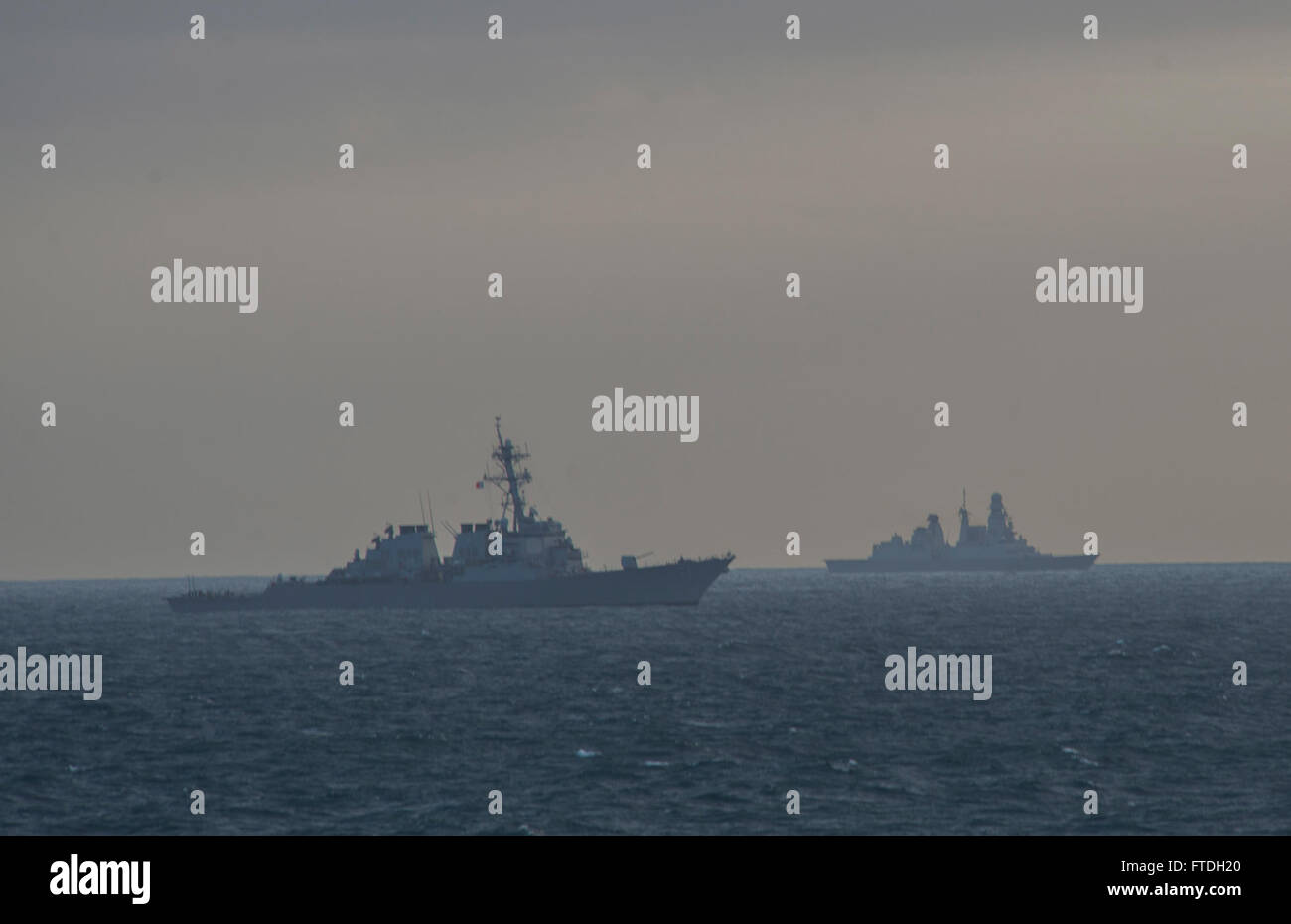 151022-N-OX430-086 ATLANTIC OCEAN (Oct. 22, 2015) Arleigh Burke-class guided-missile destroyer USS Ross (DDG 71) and 2 Andrea Doria-class Italian destroyer DDGHM Andrea Doria transit with guided-missile destroyer USS The Sullivans (DDG 68) during At Sea Demonstration 2015 (ASD 15) Oct. 22, 2015. The Sullivans is participating in ASD 15, which is a U.K.-hosted, U.S.-facilitated, multi-national demonstration of coalition integrated air and missile defense capability. (U.S. Navy photo by Mass Communication Specialist Seaman Daniel Gaither/Released) Stock Photo