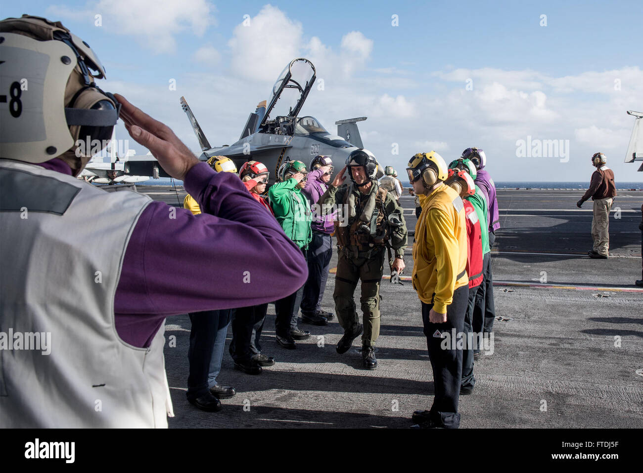 151126-N-ZG705-143  ATLANTIC OCEAN (Nov. 26, 2015) Sailors aboard aircraft carrier USS Harry S. Truman (CVN 75) greet Chief of Naval Operations Adm. John M. Richardson on the flight deck. Richardson visited Harry S. Truman for the Thanksgiving holiday with Master Chief Petty Officer of the Navy Mike Stevens. Harry S. Truman Carrier Strike Group is deployed to support maritime security operations and theater security cooperation efforts in the U.S. 5th and 6th Fleet areas of operation. (U.S. Navy photo by Mass Communication Specialist 2nd Class K. H. Anderson/Released) Stock Photo