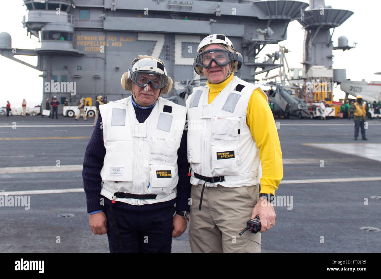 151213-N-NX690-342 MEDITERRANEAN SEA (Dec. 13, 2015) Rear Adm. Mohamed Abdel Aziz Baraya, left, Commander, North Fleet and Rear Adm. Bret Batchelder, Commander, Carrier Strike Group 8, pose for a photograph on the flight deck of aircraft carrier USS Harry S. Truman (CVN 75). Harry S. Truman Carrier Strike Group is conducting naval operations in the U.S. 6th Fleet area of operations in support of U.S. national security interests in Europe and Africa. (U.S. Navy photo by Mass Communication Specialist 3rd Class J. M. Tolbert/Released) Stock Photo