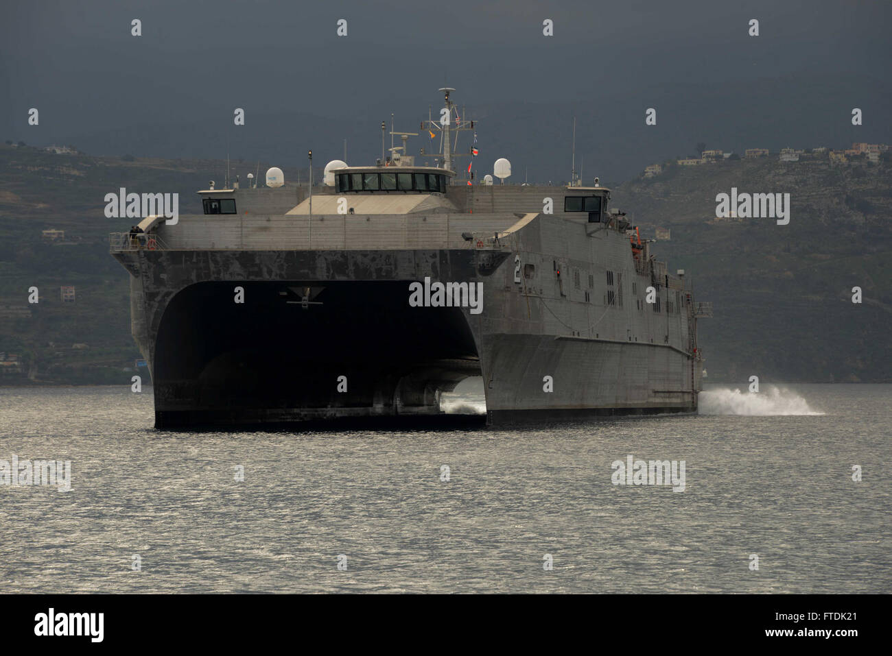 151230-N-IL474-052  SOUDA BAY, Greece (Dec. 30, 2015) – The Military Sealift Command Expeditionary Fast Transport ship , USNS Choctaw County (T-EPF 2), arrives in Souda Bay for a scheduled port visit Dec. 30, 2015.  Choctaw County is the second of 10 vessels designed for rapid intra-theater transportation of troops and military equipment.  (U.S. Navy photo by Heather Judkins/Released) Stock Photo