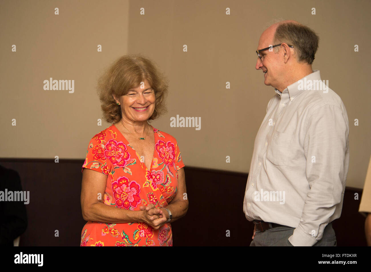 The photo shows U.S. Ambassador Shari Villarosa and Professor Larry ...