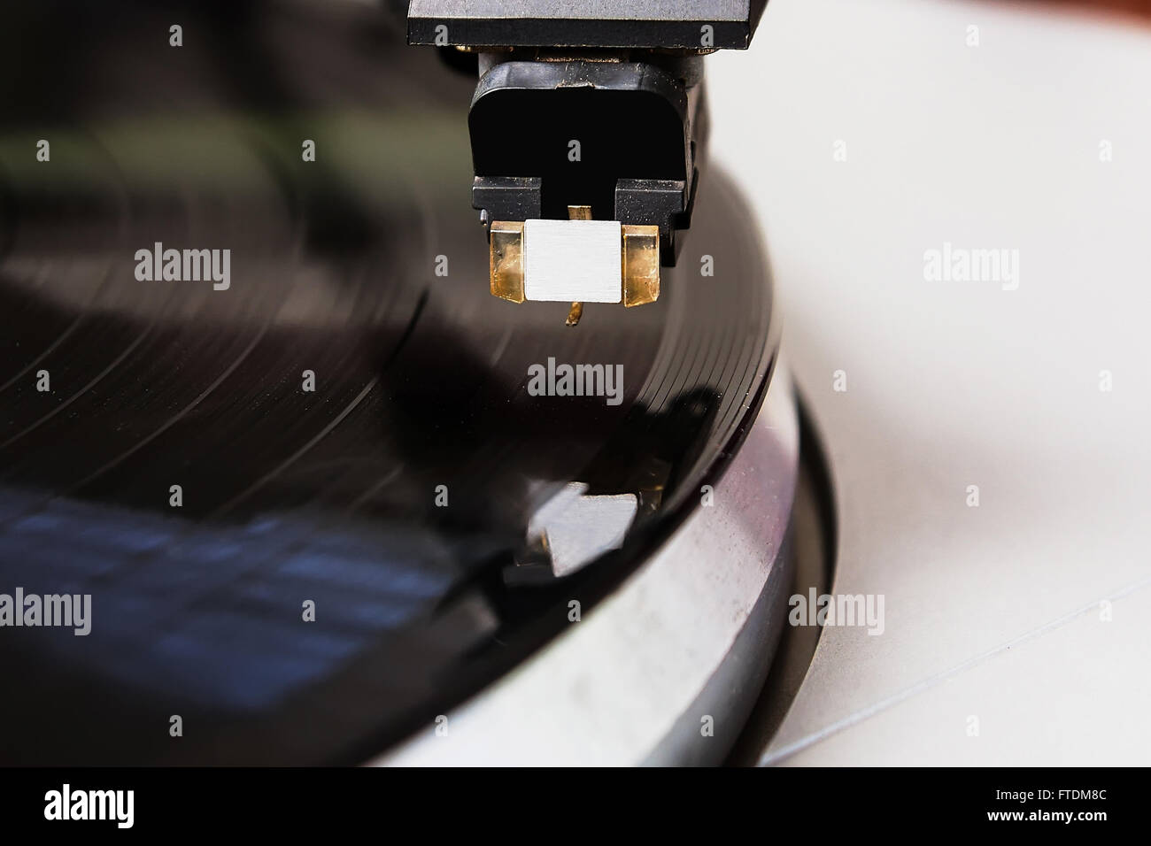 Turntable player with musical vinyl record. Useful for DJ,