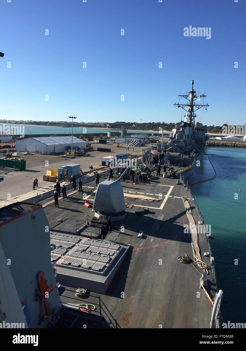 160229-N-YN258-002 ROTA, Spain (Feb. 29, 2016) USS Porter (DDG 78) pulls into port Feb. 29, 2016. Porter, an Arleigh Burke-class guided missile destroyer, forward-deployed to Rota, Spain, is preparing for deployment in the U.S. 6th Fleet area of operations in support of U.S. national security interests in Europe. (U.S. Navy photo by Lt.j.g Laura Adams/Released) Stock Photo