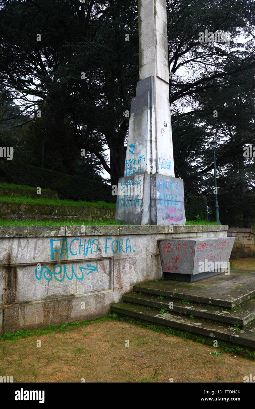 Aborto livre / free abortion protest graffiti on base of Cruz de los Caidos monument to those who died in the Spanish Civil War, Vigo, Galicia, Spain Stock Photo