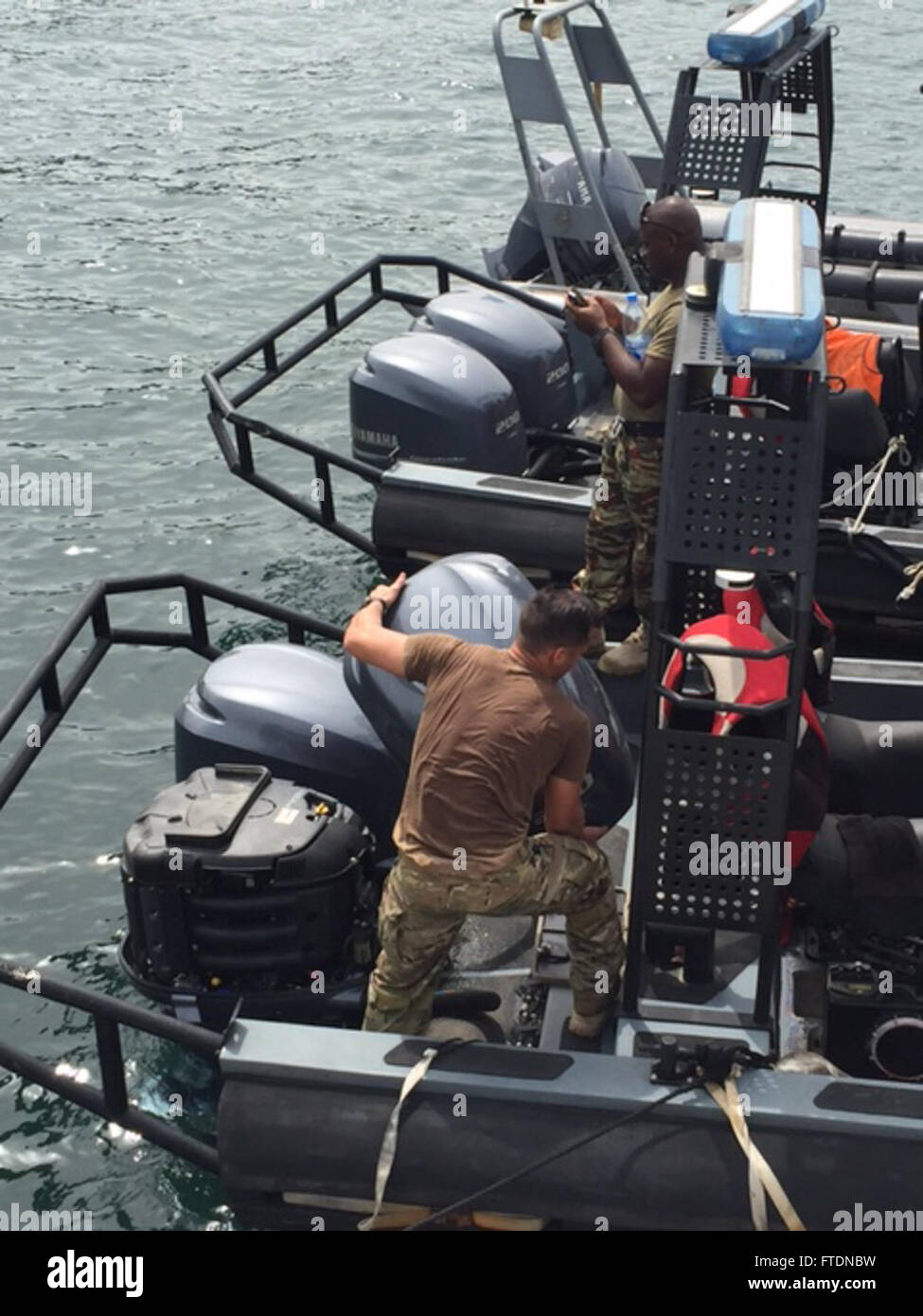A U.S. Coast Guard Law Enforcement Detachment member trains with ...