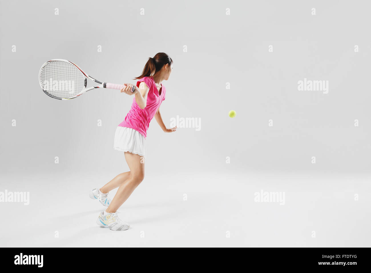 Young Japanese tennis player in action Stock Photo - Alamy