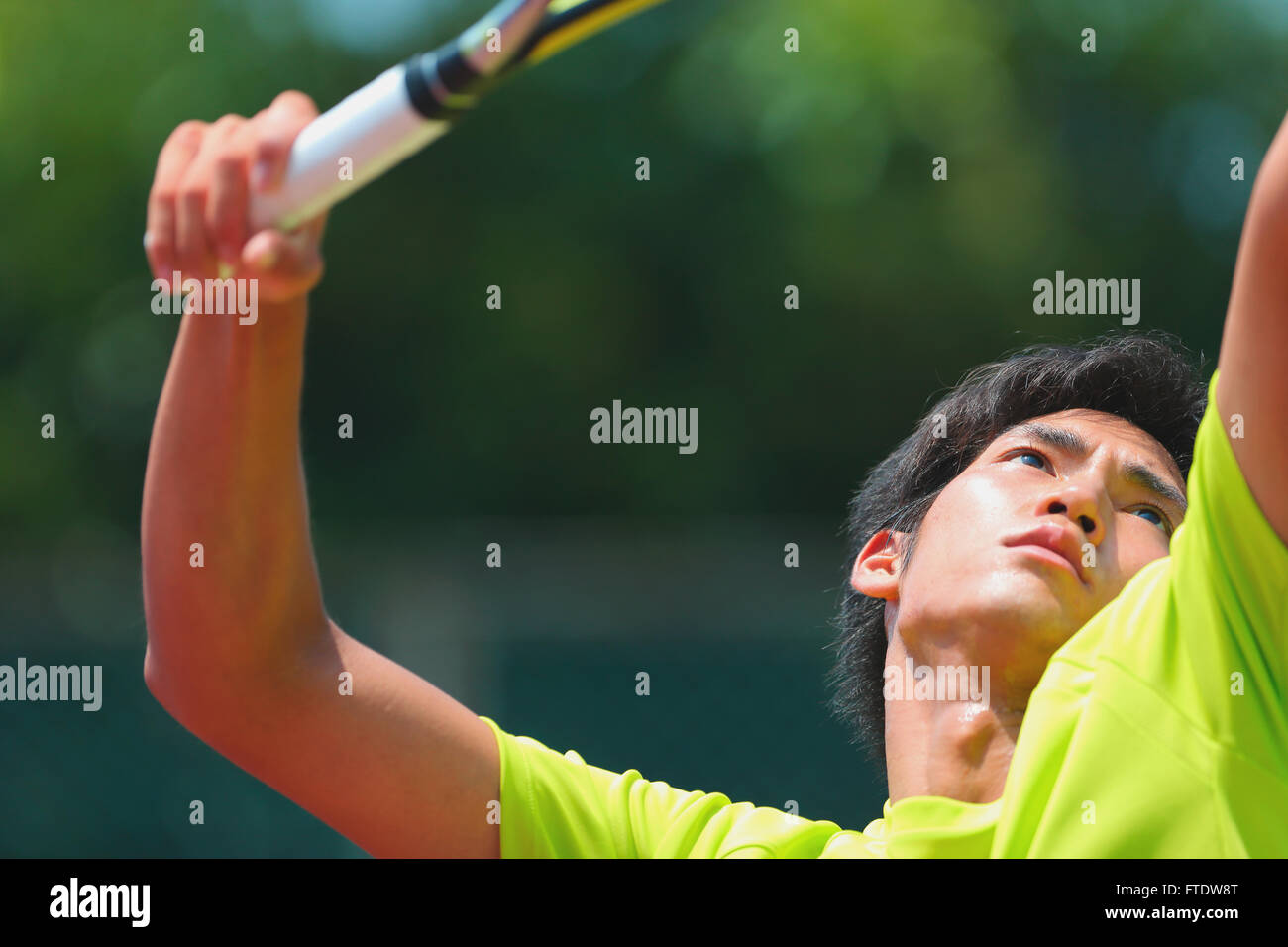 Young Japanese tennis player in action Stock Photo - Alamy