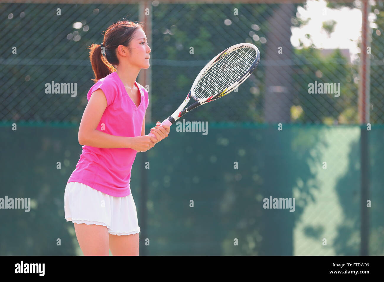 Young Japanese tennis player in action Stock Photo - Alamy