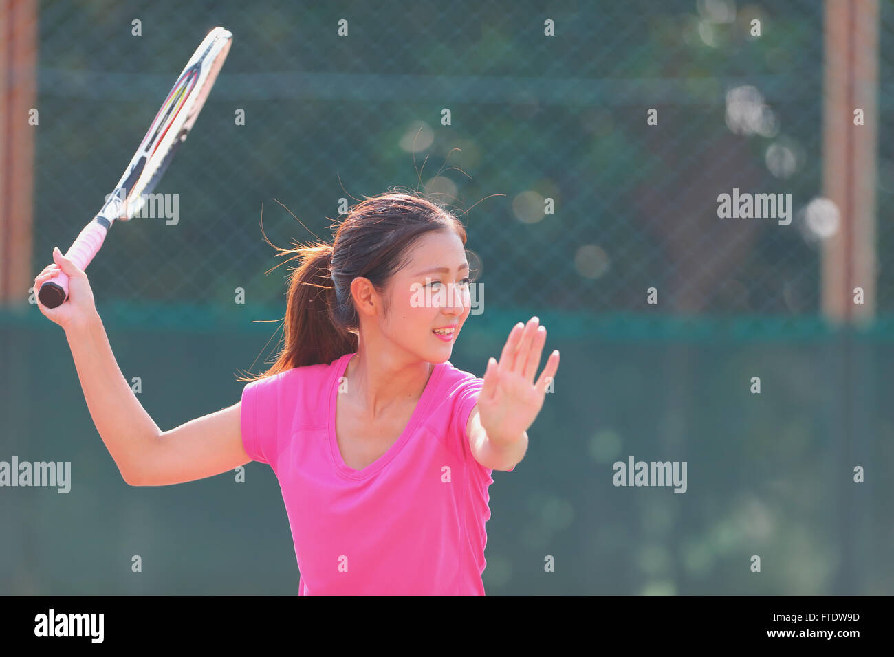 Young Japanese tennis player in action Stock Photo - Alamy