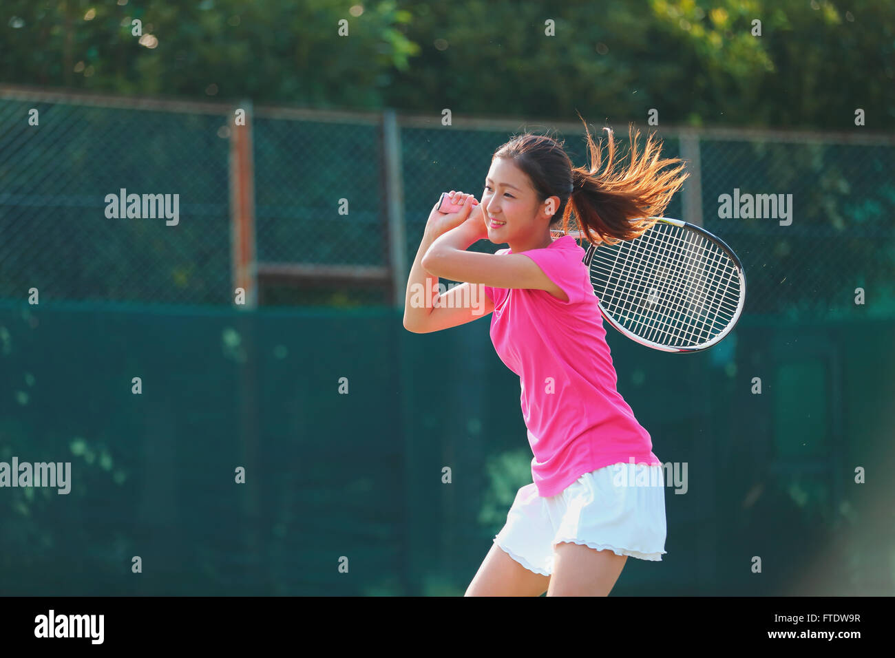 Young Japanese tennis player in action Stock Photo - Alamy