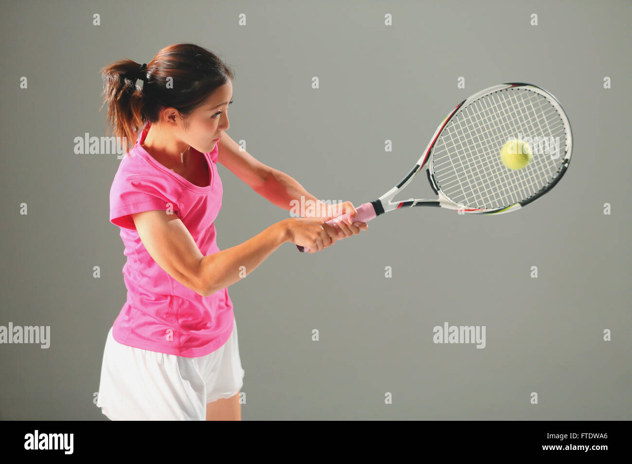Young Japanese tennis player in action Stock Photo - Alamy