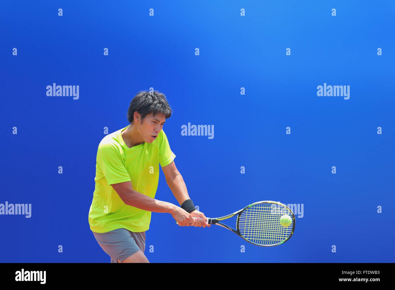 Young Japanese tennis player in action Stock Photo - Alamy