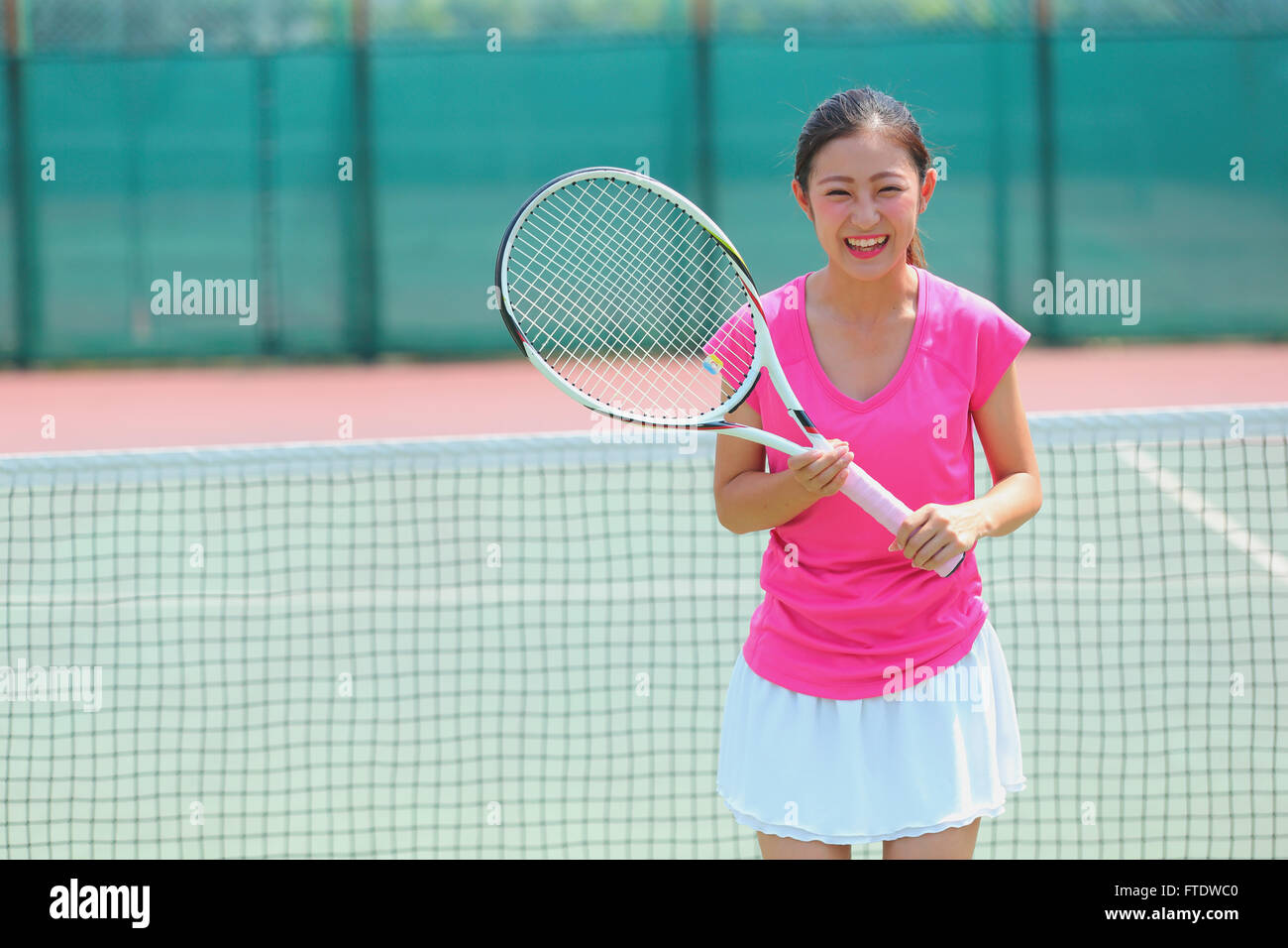 Young Japanese tennis player in action Stock Photo Alamy