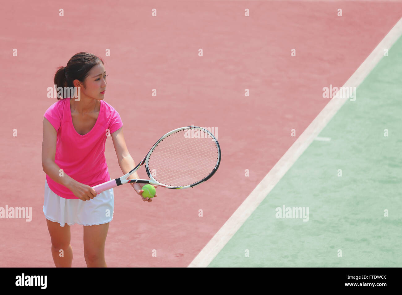 Young Japanese tennis player in action Stock Photo - Alamy