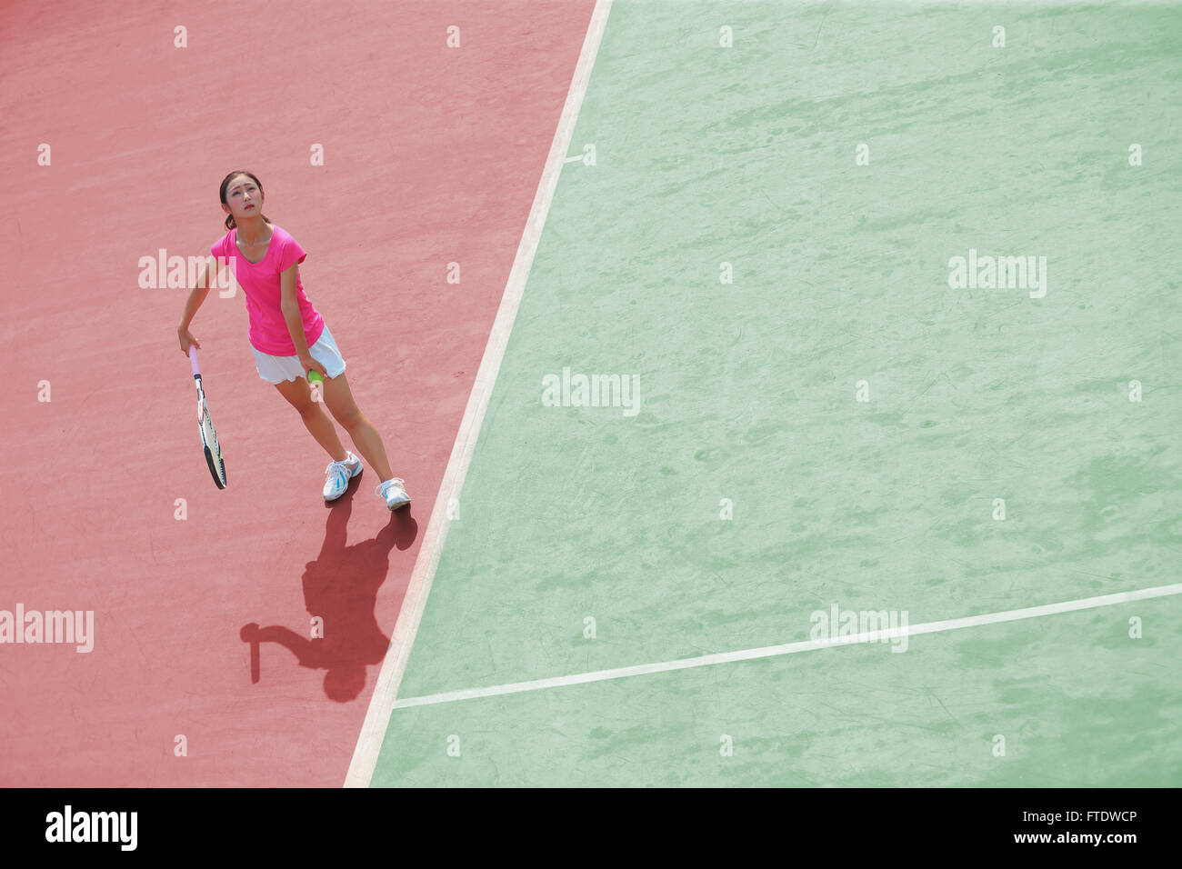 Young Japanese tennis player in action Stock Photo - Alamy