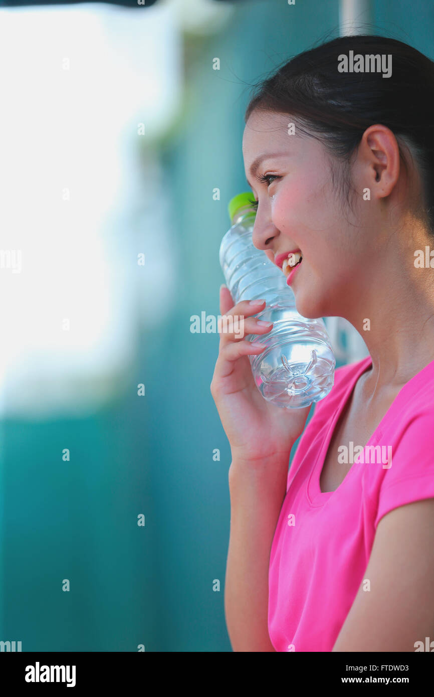 Young Japanese tennis player on the court Stock Photo Alamy