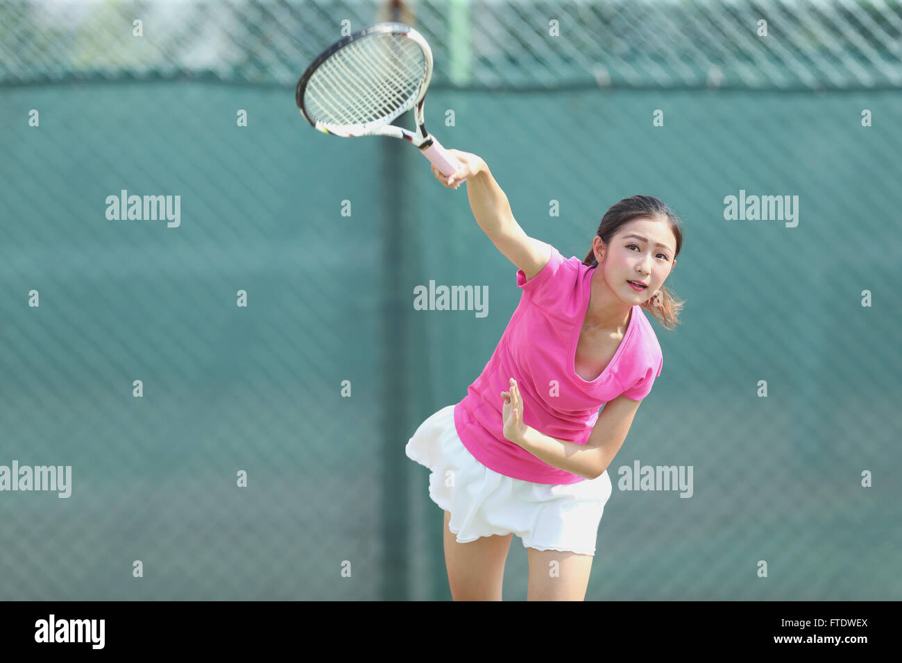 Young Japanese tennis player in action Stock Photo Alamy