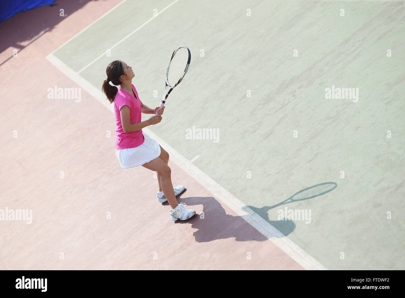 Young Japanese tennis player in action Stock Photo Alamy
