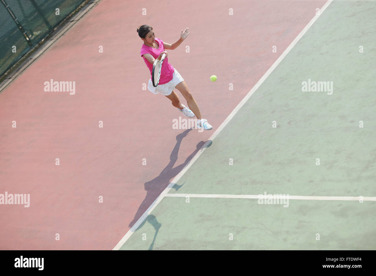 Young Japanese tennis player in action Stock Photo - Alamy