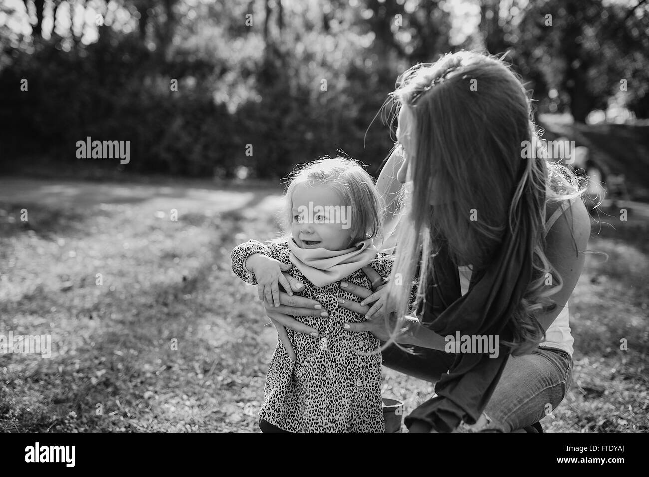 young family walking in the park Stock Photo