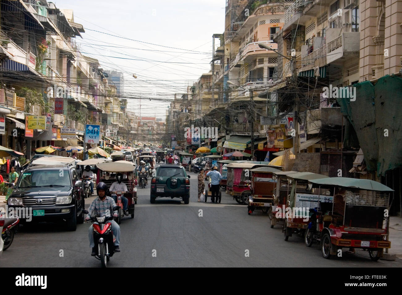 Street 107 is bustling with activity and traffic in Phnom Penh, Cambodia. Stock Photo