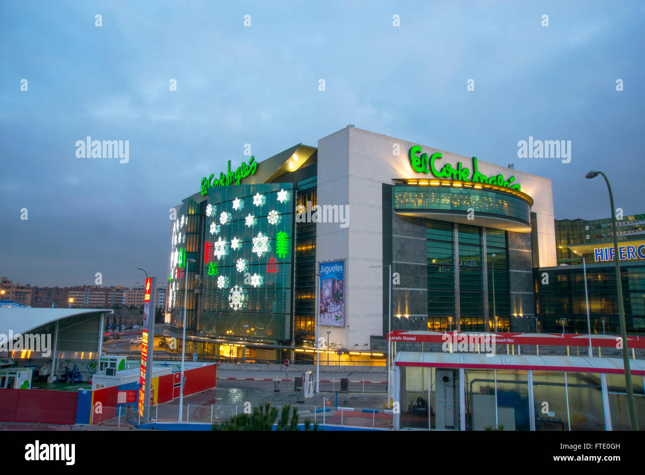 Facade of El Corte Ingles shopping center at Christmas time, night view. Sanchinarro, Madrid, Spain. Stock Photo