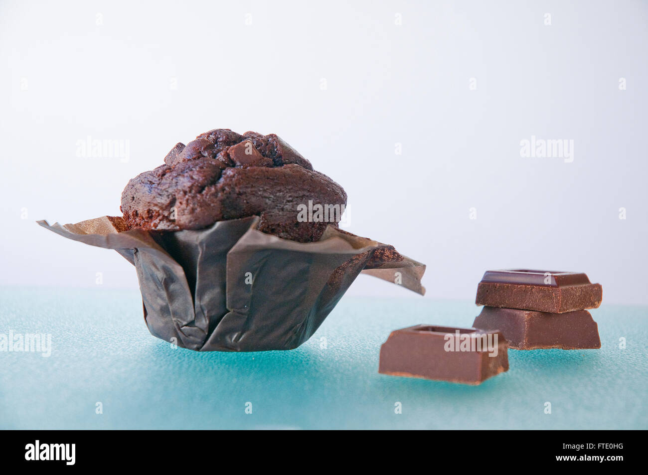 Chocolate muffins with edible eyes in paper holders Stock Photo - Alamy