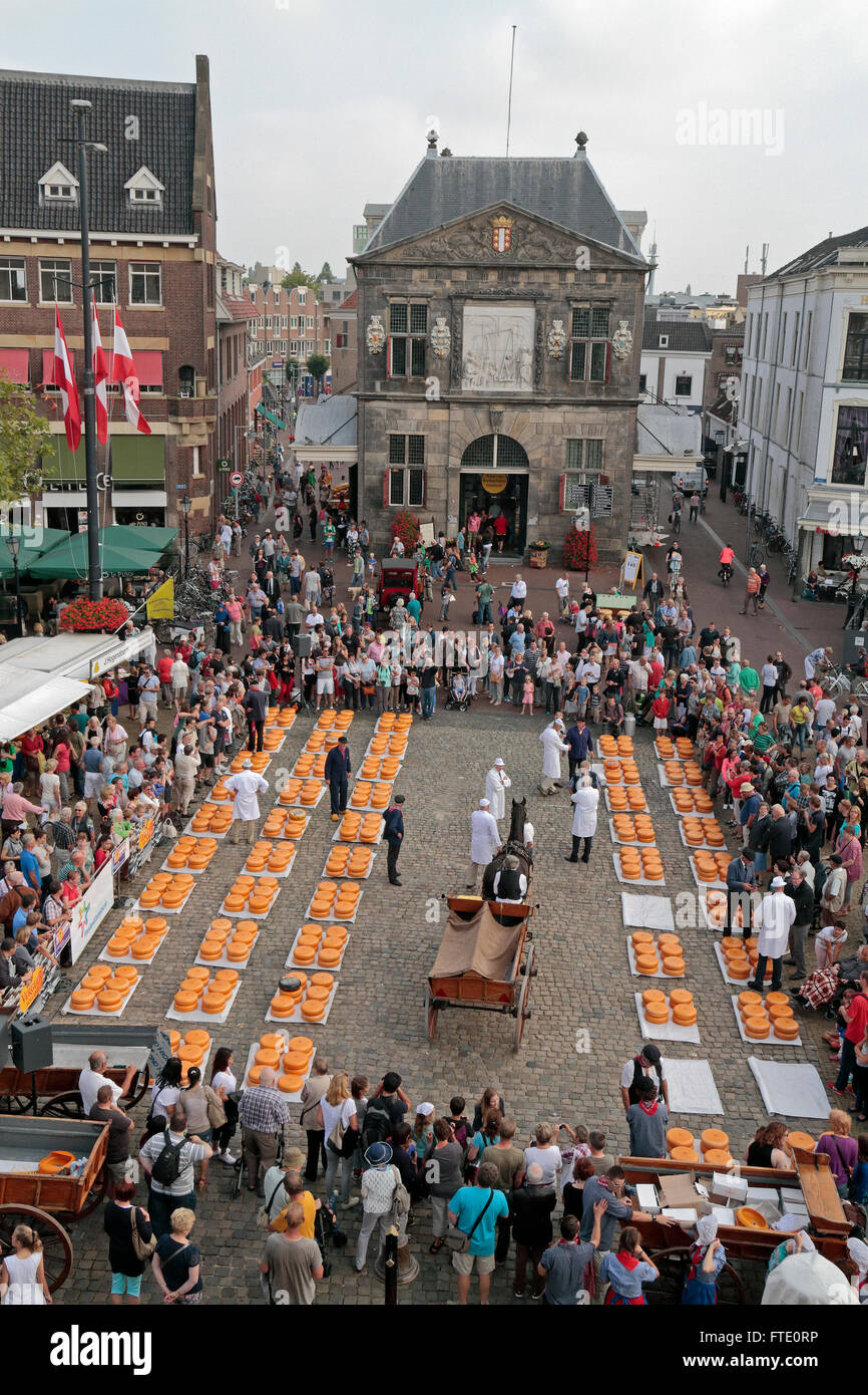 Looking down on the famous cheese market with the Goudse Waag (weigh house) in Gouda, South Holland, Netherlands. Stock Photo