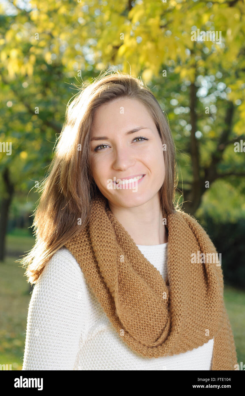 Young woman portrait in autumn fall park Stock Photo - Alamy