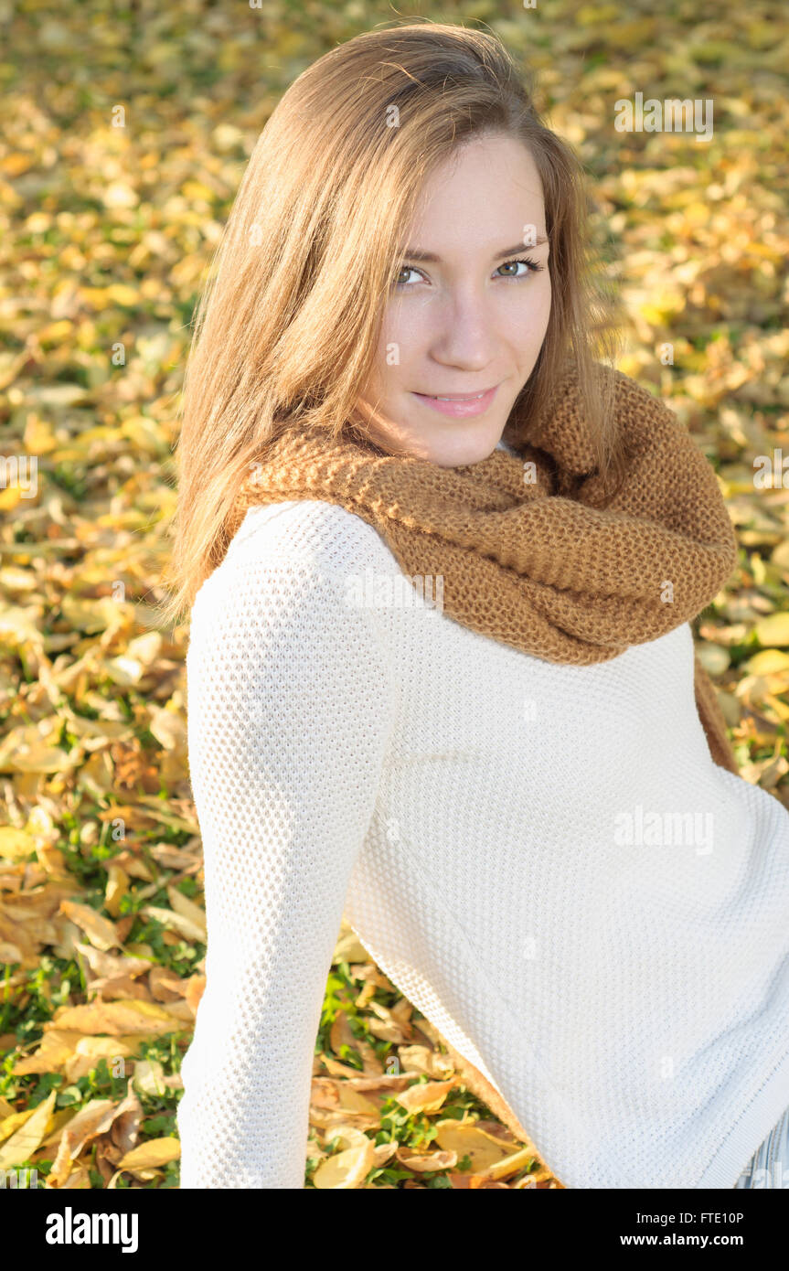 Young woman portrait in autumn fall park Stock Photo - Alamy