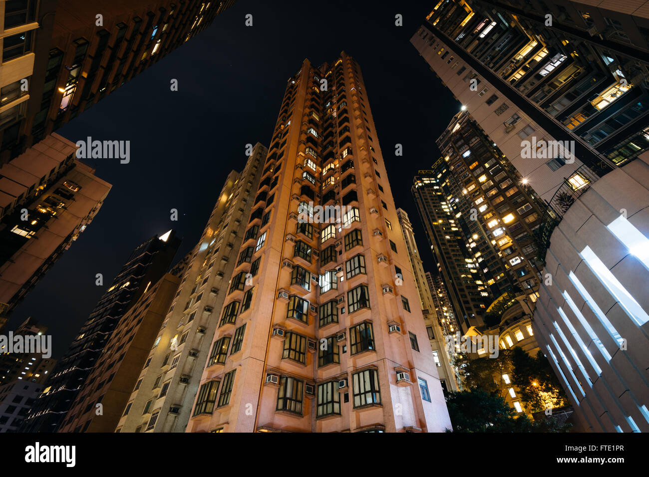 Skyscrapers at night in Hong Kong Stock Photo - Alamy