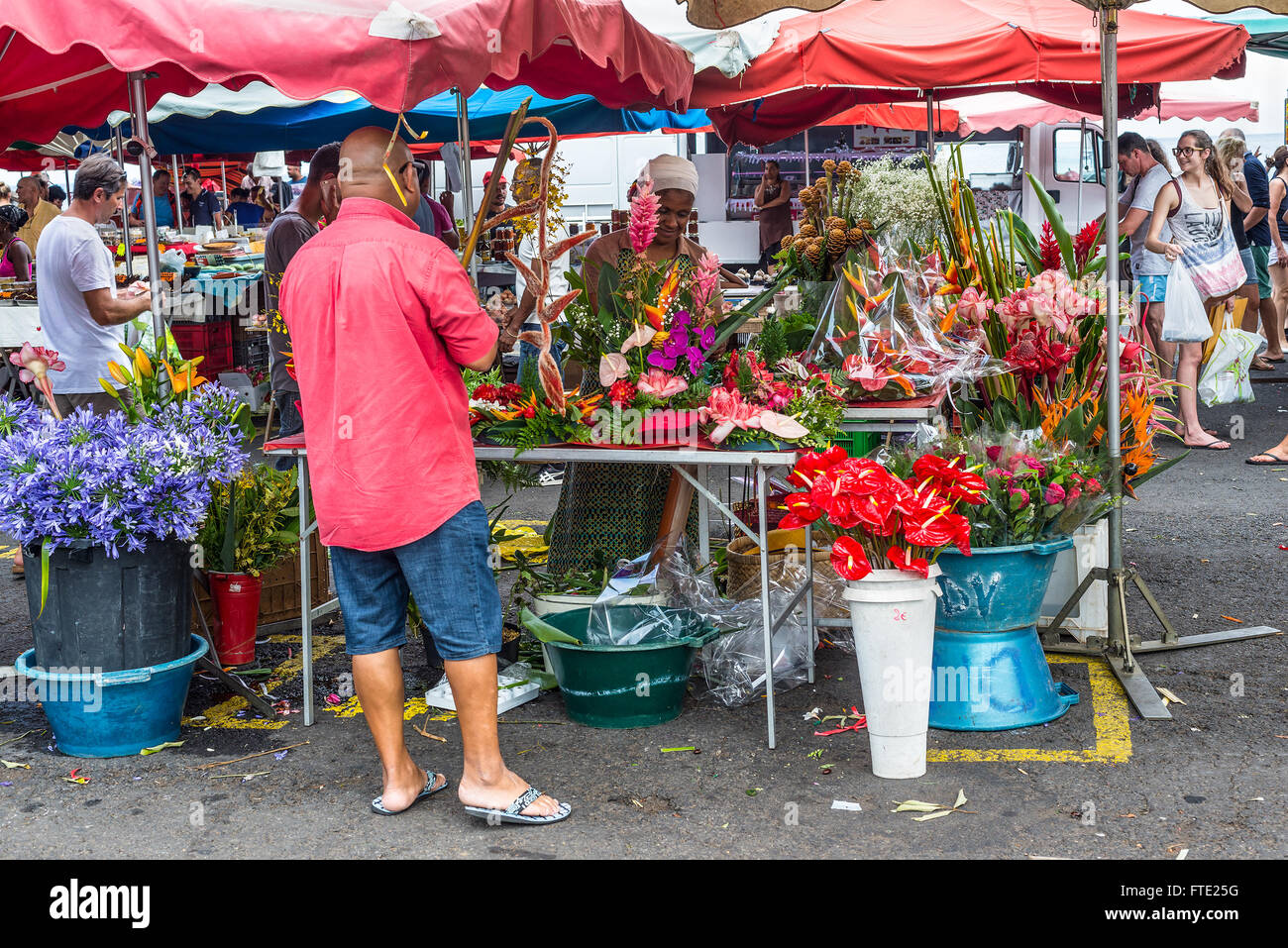 Florist and vendor on a local market in Saint Paul on the island of La