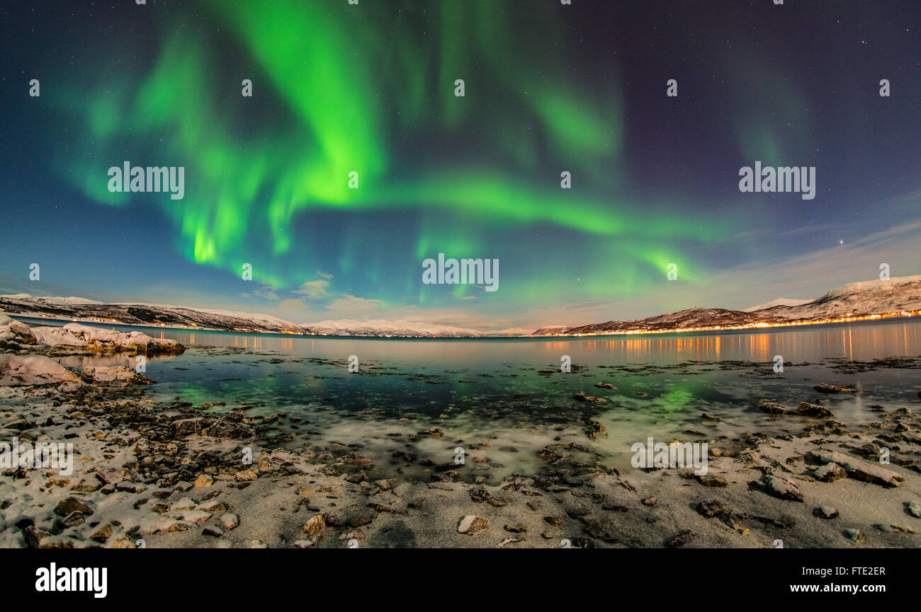 Aurora Borealis dancing over fjord, Tromso Northern Norway Stock Photo ...