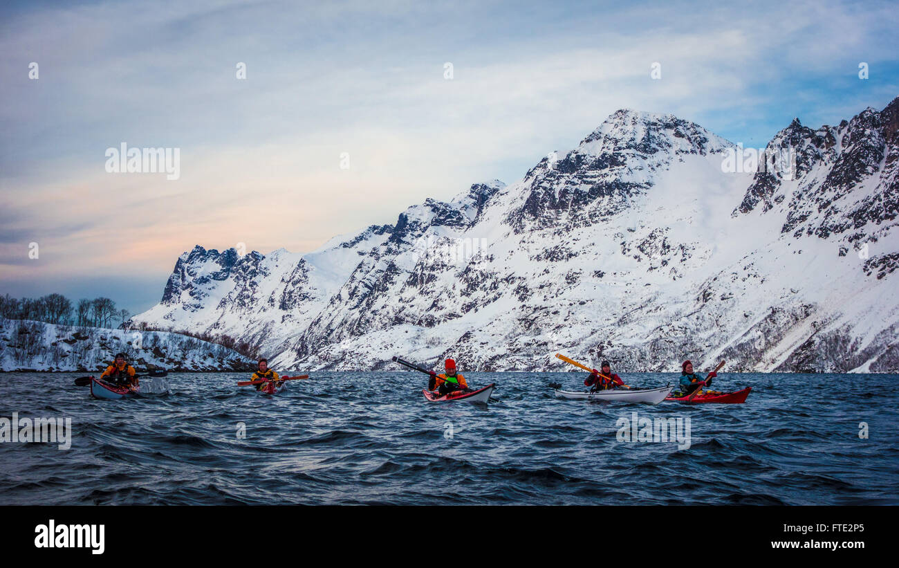 Winter kayaking in Ersfjord, Kvaloya near Tromso Northern Norway Stock