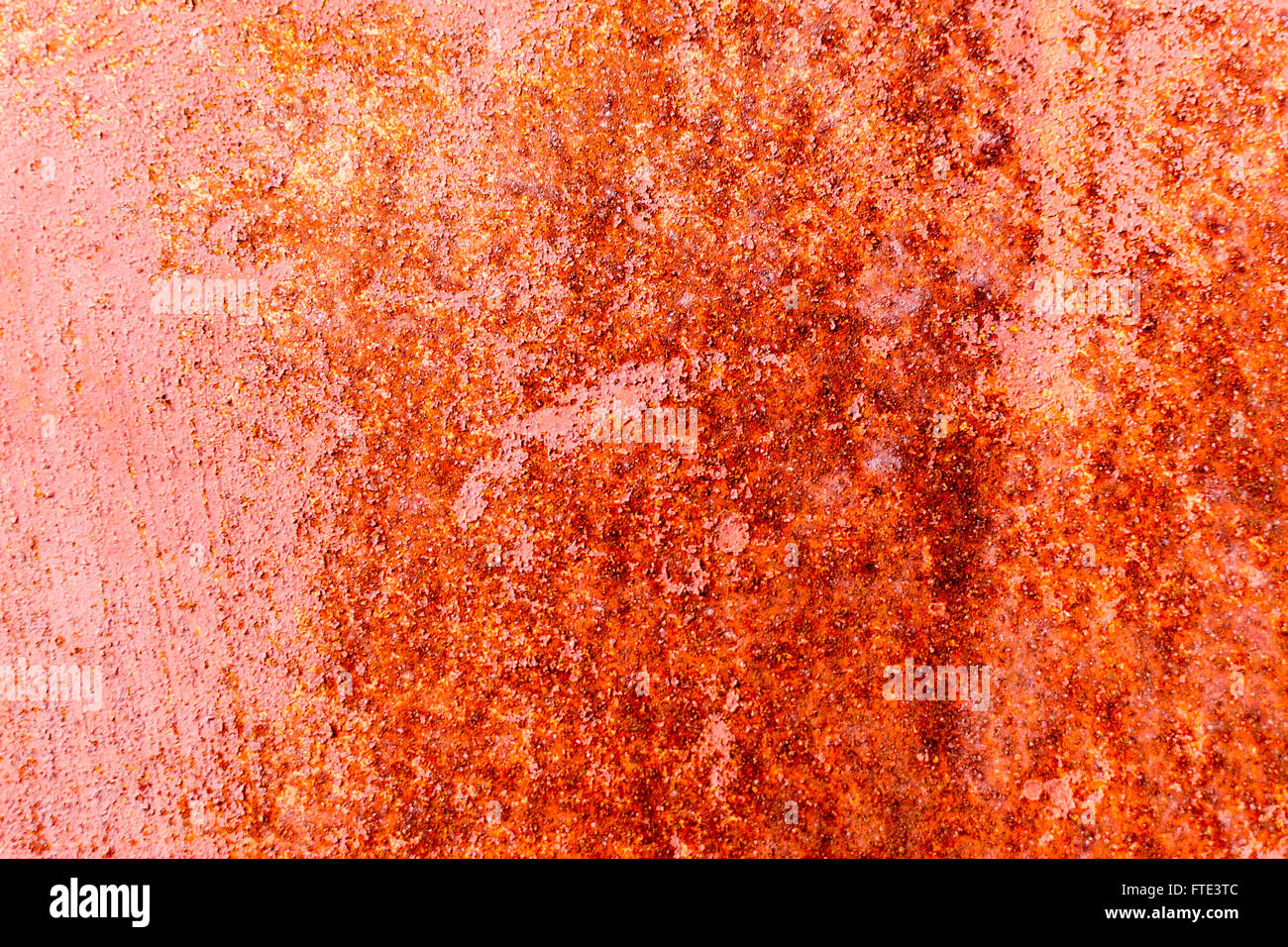 Dark red and orange rust patterns with flecks of metal oxidastion with