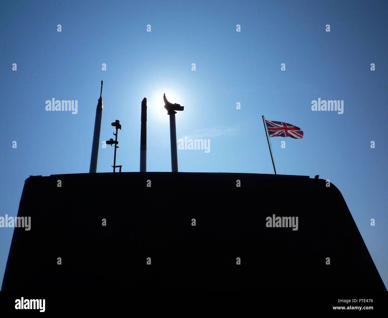 British submarine conning tower with a raised periscope and union jack