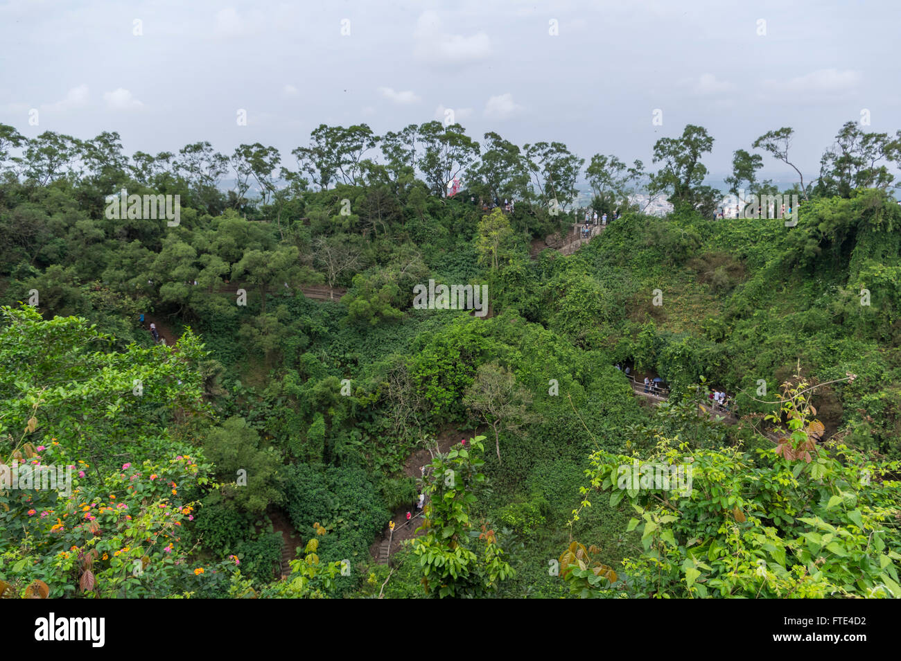 Fengluling volcano crater, covered by tropical rainforest, at the Haikou Volcanic Cluster Global Geopark, Hainan, China. Stock Photo