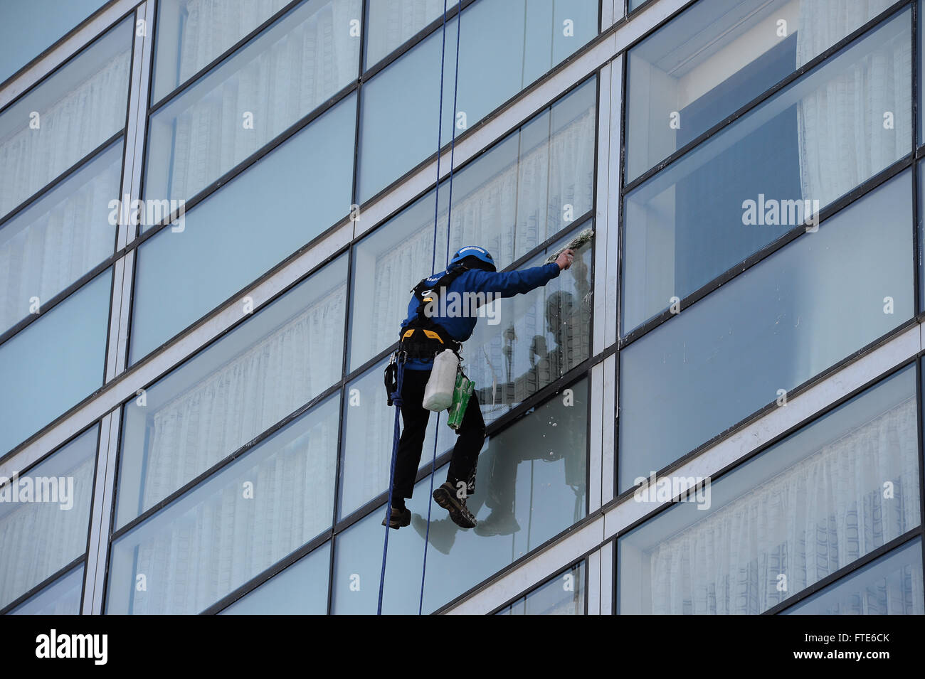 Abseiling window cleaners, clean the windows at the Lowry Hotel