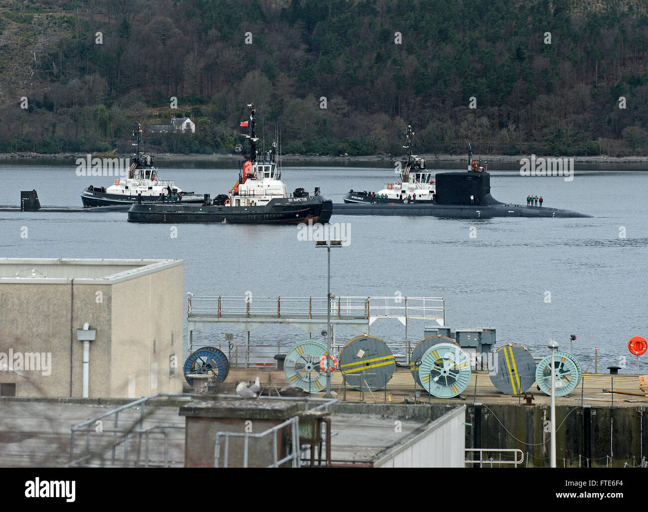 160322-N-ZZ999-009 FASLANE, United Kingdom (March 22, 2016) The Virginia-class attack submarine USS Virginia (SSN 774) arrives at Her Majesty's Naval Base, Clyde for a scheduled port visit March 22, 2016. Virginia is conducting naval operations in the U.S. 6th Fleet area of operations in support of U.S. national security interests in Europe. (Photo courtesy of Royal Navy/Released) Stock Photo