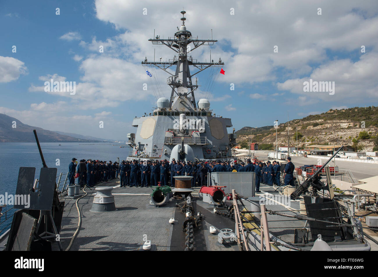 131025-N-VC236-053: SOUDA BAY, Greece (Oct. 25, 2013) - Sailors aboard the Arleigh Burke-class guided-missile destroyer USS Ramage (DDG 61) muster on the forecastle for an awards presentation and all hands call with the commanding officer. Ramage, homeported in Norfolk, Va., are on a scheduled deployment supporting maritime security operations and theater security cooperation efforts in the U.S. 6th Fleet area of operations. (U.S. Navy Photo by Mass Communication Specialist 3rd Class Jackie Hart/Released) Stock Photo