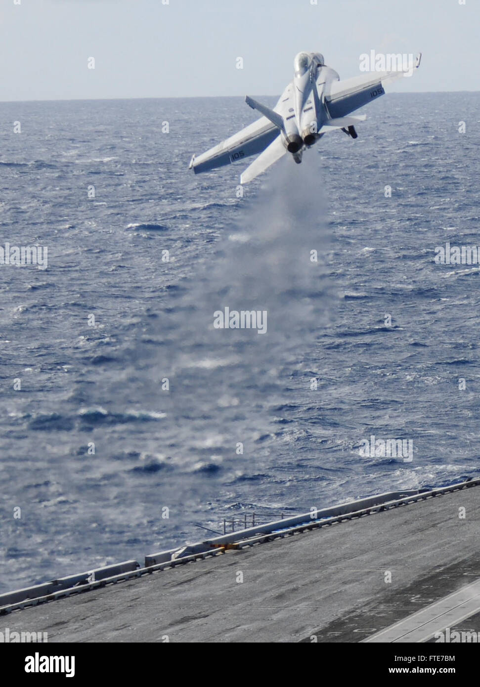 MEDITERRANEAN SEA (Nov. 6, 2013) - An F/A-18F Super Hornet assigned to the “Black Knights” of Strike Fighter Squadron (VFA) 154 launches from the flight deck of the aircraft carrier USS Nimitz (CVN 68). Nimitz is deployed supporting maritime security operations and theater security cooperation efforts in the U.S. 6th Fleet area of operations. (U.S. Navy photo by Mass Communication Specialist 2nd Class Jacquelyn D. Childs/ Released) Stock Photo