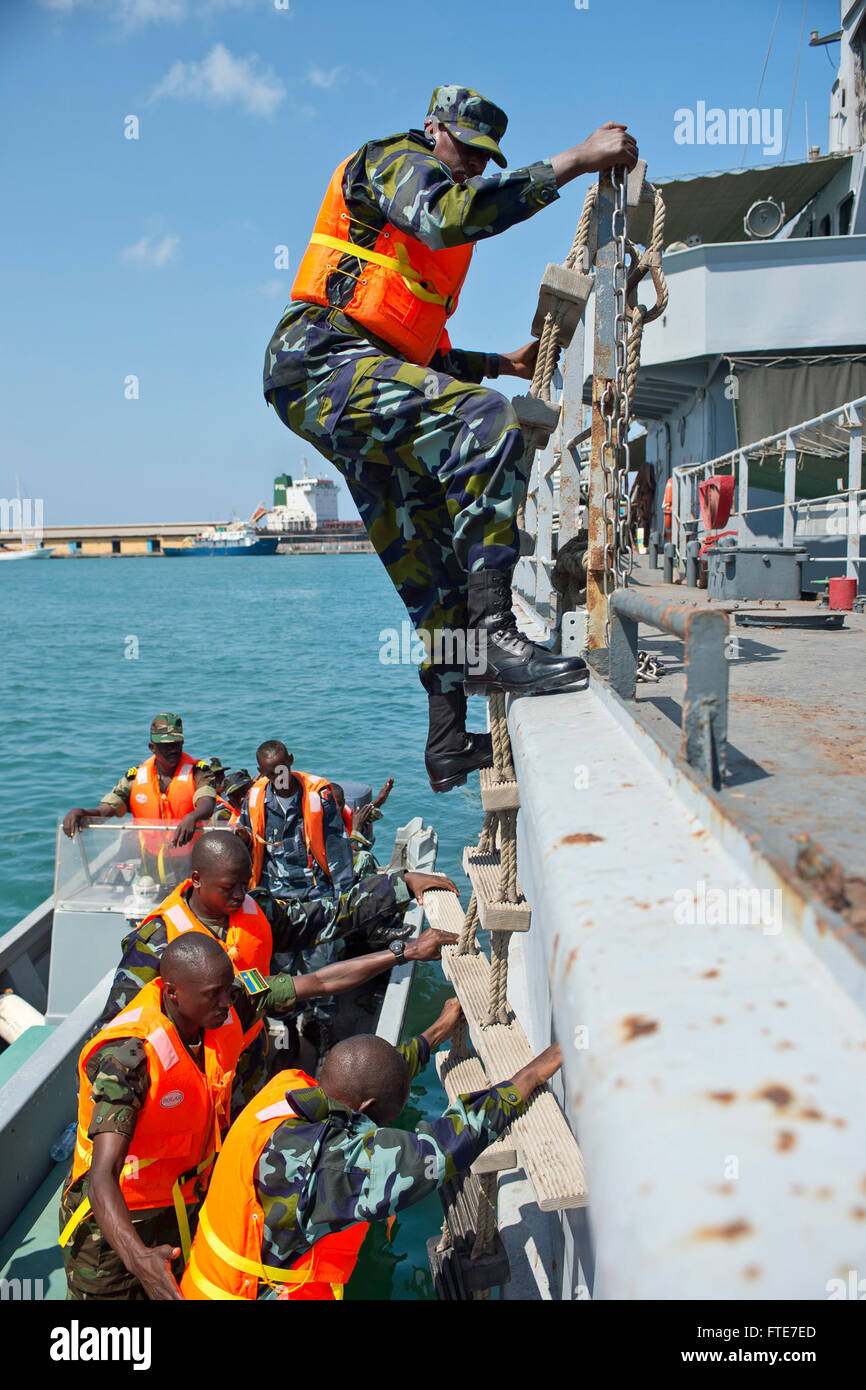 In this photograph from Exercise Cutlass Express 2013, Djiboutian Marines practice a ship-boarding scenario at the Port of Djibouti. The exercise is aimed at enhancing maritime security and cooperation among participating nations in the Horn of Africa region. Stock Photo