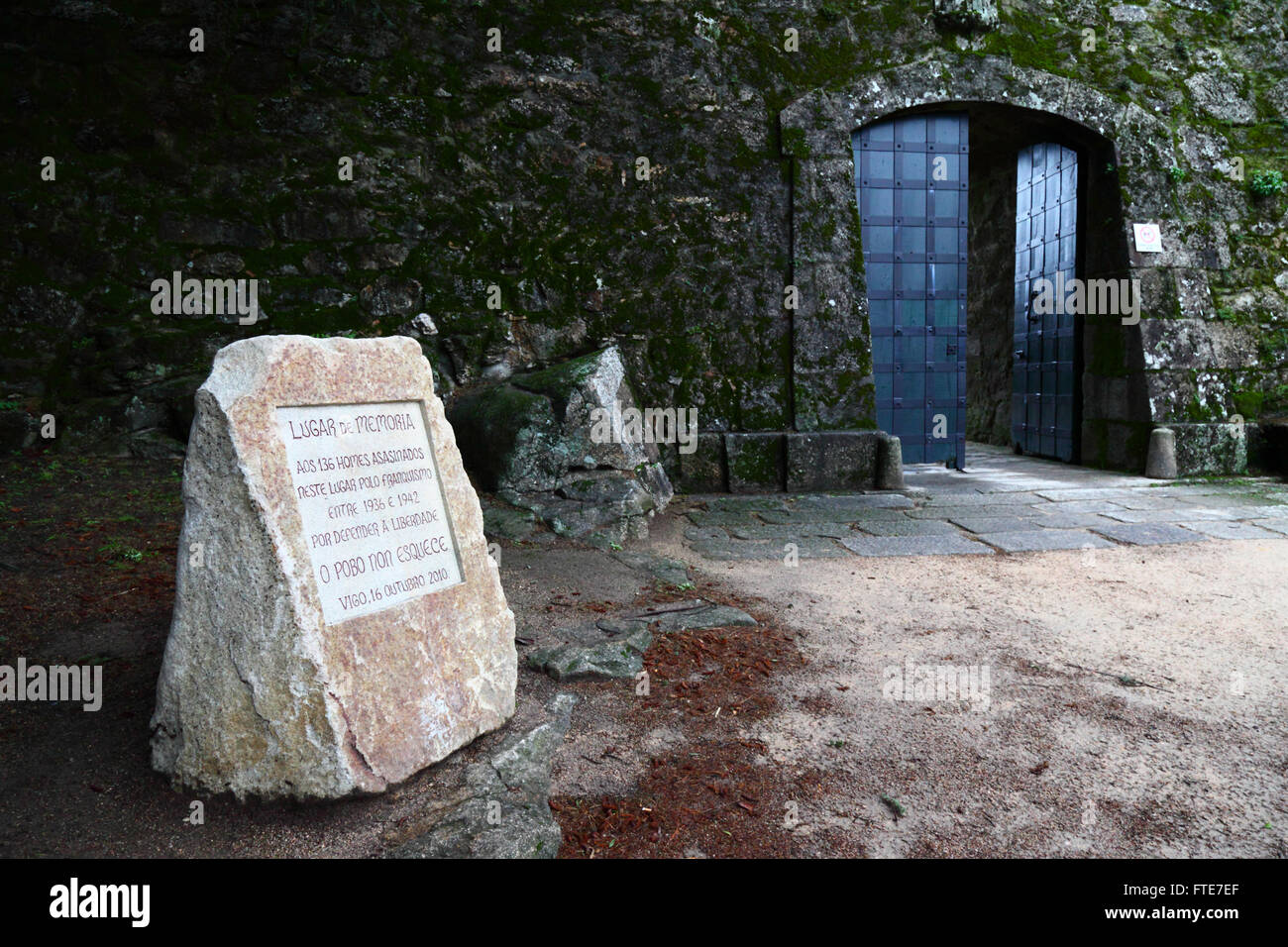Monument to 136 men killed by Francoist regime between 1936 and 1942 outside entrance to Castillo del Castro fort, Vigo, Spain Stock Photo