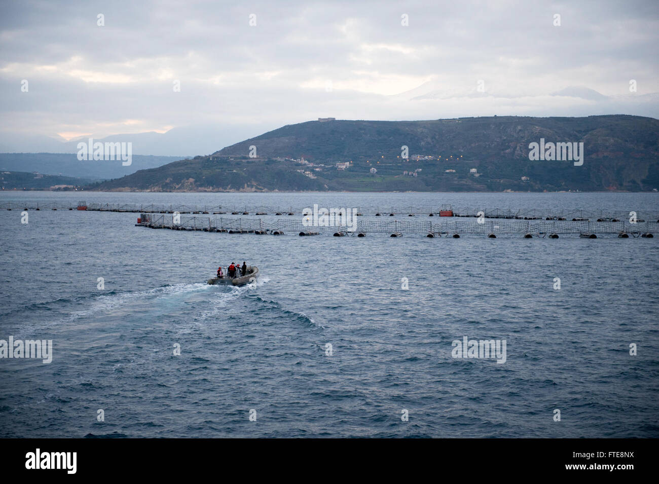 Sailors aboard the USS Stout (DDG 55) conduct maneuvers with a rigid ...