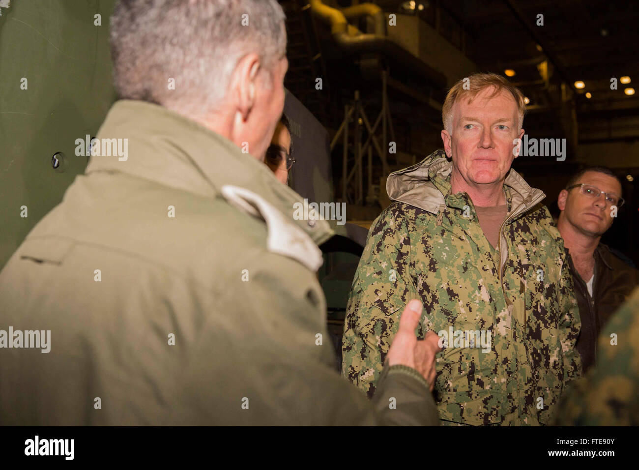 150104-M-YH418-046 MEDITERRANEAN SEA (Jan. 4, 2015) Vice Adm. James Foggo, III, U.S. 6th Fleet commander, right, speaks with a guest with the Israel Defense Force in the well deck aboard USS New York (LPD 21) Jan. 4, 2015. New York, a San Antonio-class amphibious transport dock ship, deployed as part of the Iwo Jima Amphibious Ready Group/24th Marine Expeditionary Unit, is conducting naval operations in the U.S. 6th Fleet area of operations in support of U.S. national security interests in Europe. (U.S. Marine Corps photo by Cpl. Todd F. Michalek/Released) Stock Photo