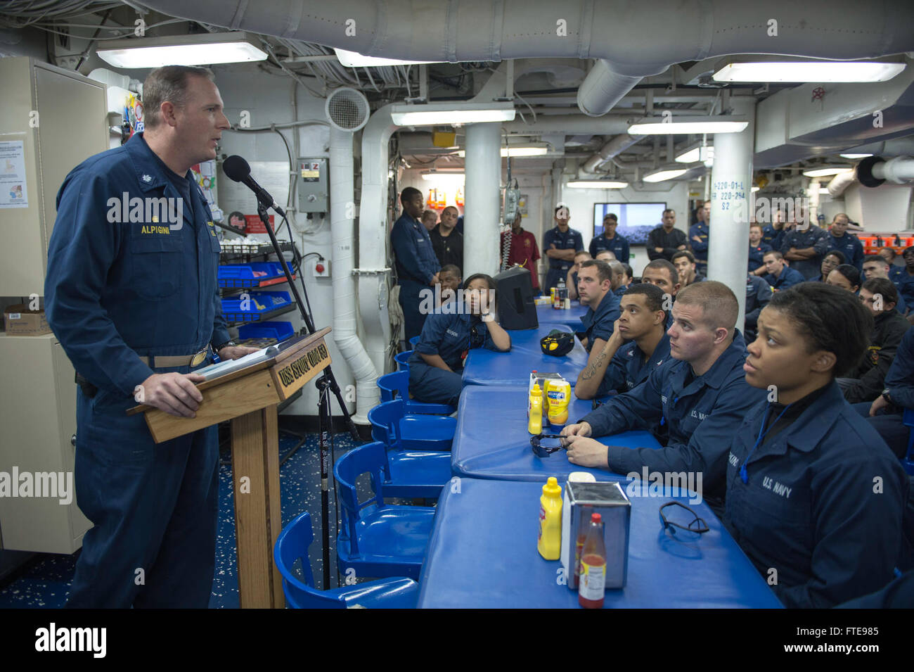 MEDITERRANEAN SEA (Jan. 18, 2014) -  Cmdr. Robert Alpigini, commanding officer of the Arleigh Burke-class guided-missile destroyer USS Stout (DDG 55), addresses the crew during a commemoration ceremony honoring Dr. Martin Luther King Jr.  Stout, homeported in Norfolk, Va., is on a scheduled deployment supporting maritime security operations and theater security cooperation efforts in the U.S. 6th Fleet area of operation. (U.S. Navy photo by Mass Communication Specialist 2nd Class Amanda R. Gray/Released) Stock Photo